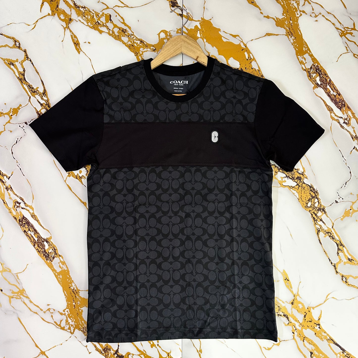 Polera Coach